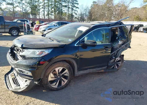 2016 Honda Cr-V Touring z USA, uszkodzony, nr VIN 5J6RM4H98GL046510